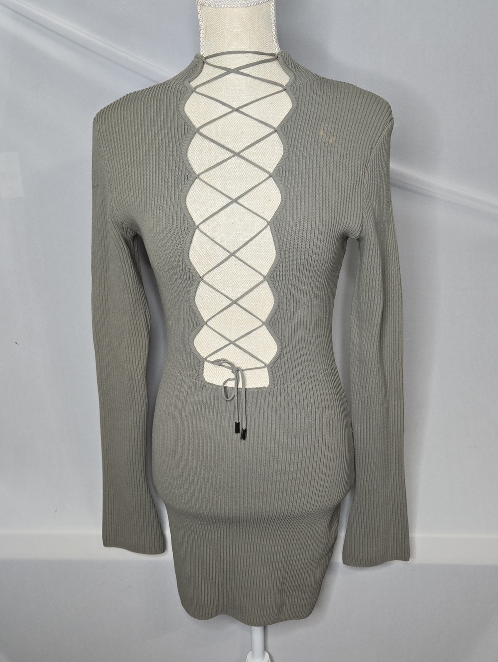 House of CB 'Jada' artichoke green ribbed knit dress featuring a plunging lace-u